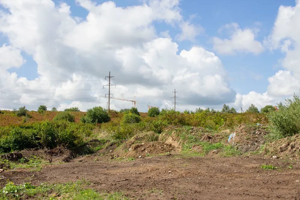 Raw commercial land property in Burlington, NC Vacant commercial real estate parcel in Burlington, NC